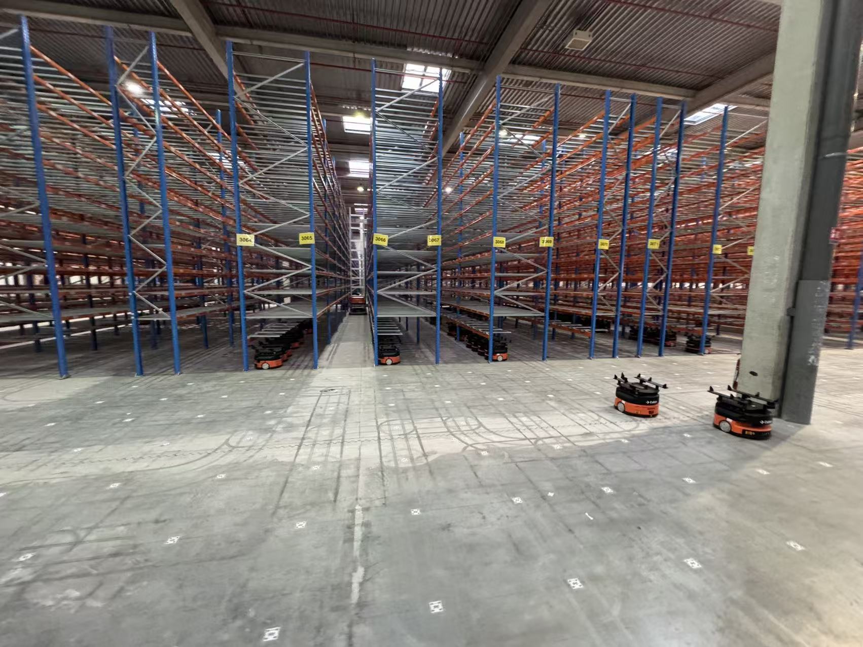 Warehouse automation system and racking